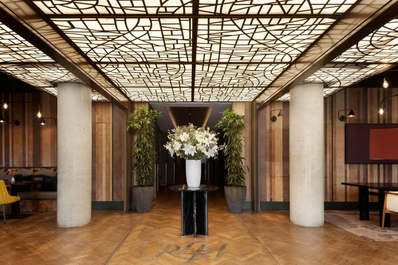 Hotel lobby with flowers at Montcalm Royal London House, Finsbury Square
