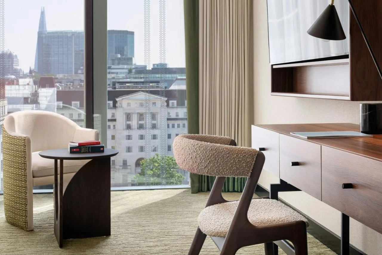 Room with desk and window at Montcalm Royal London House, near Barbican Centre